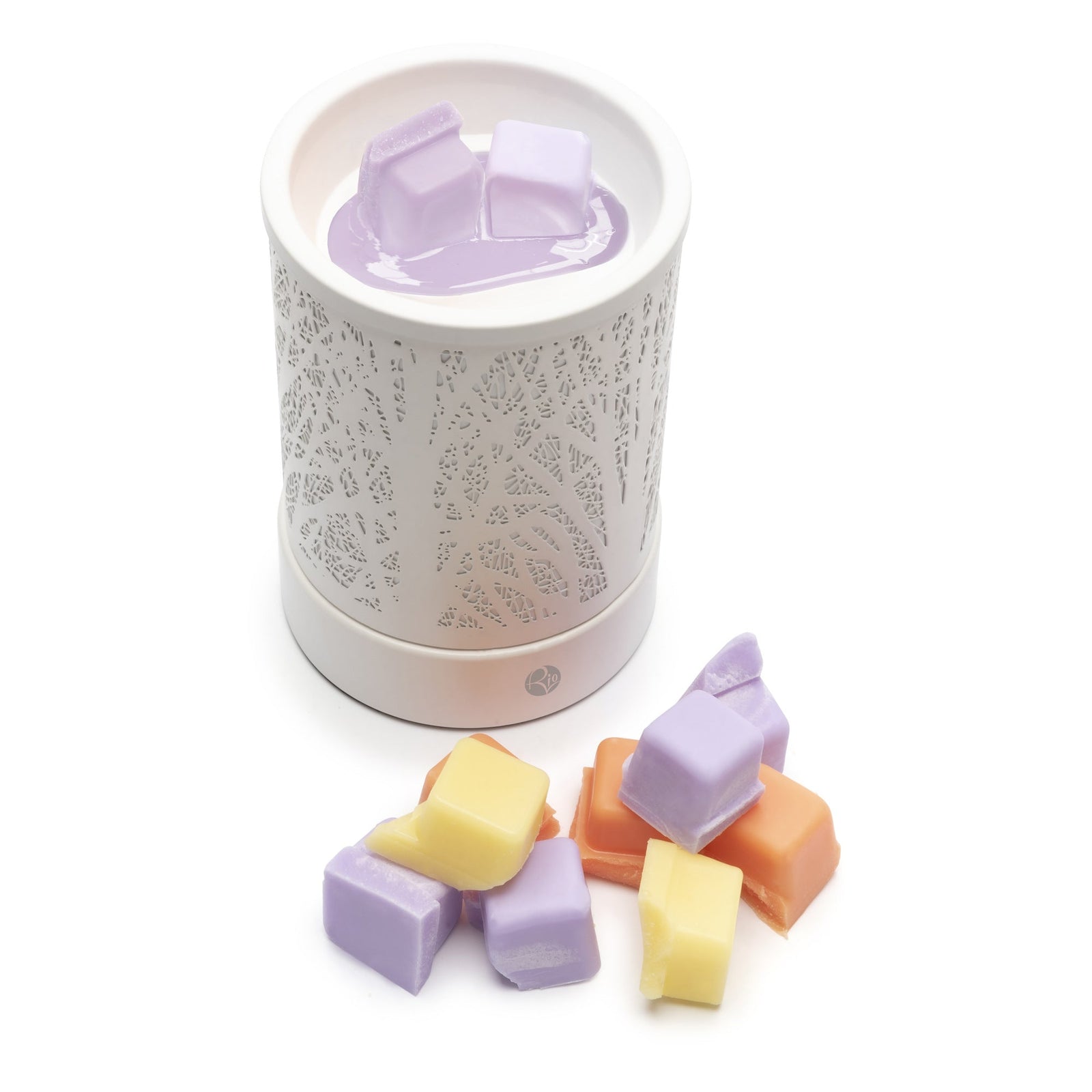 A white electric wax warmer with a lacy pattern melts Rio’s Scented Soy Wax Melts—Pack of 5 Fragrances—in rich purple, orange, and yellow blocks, ready to fill your space with inviting aroma.