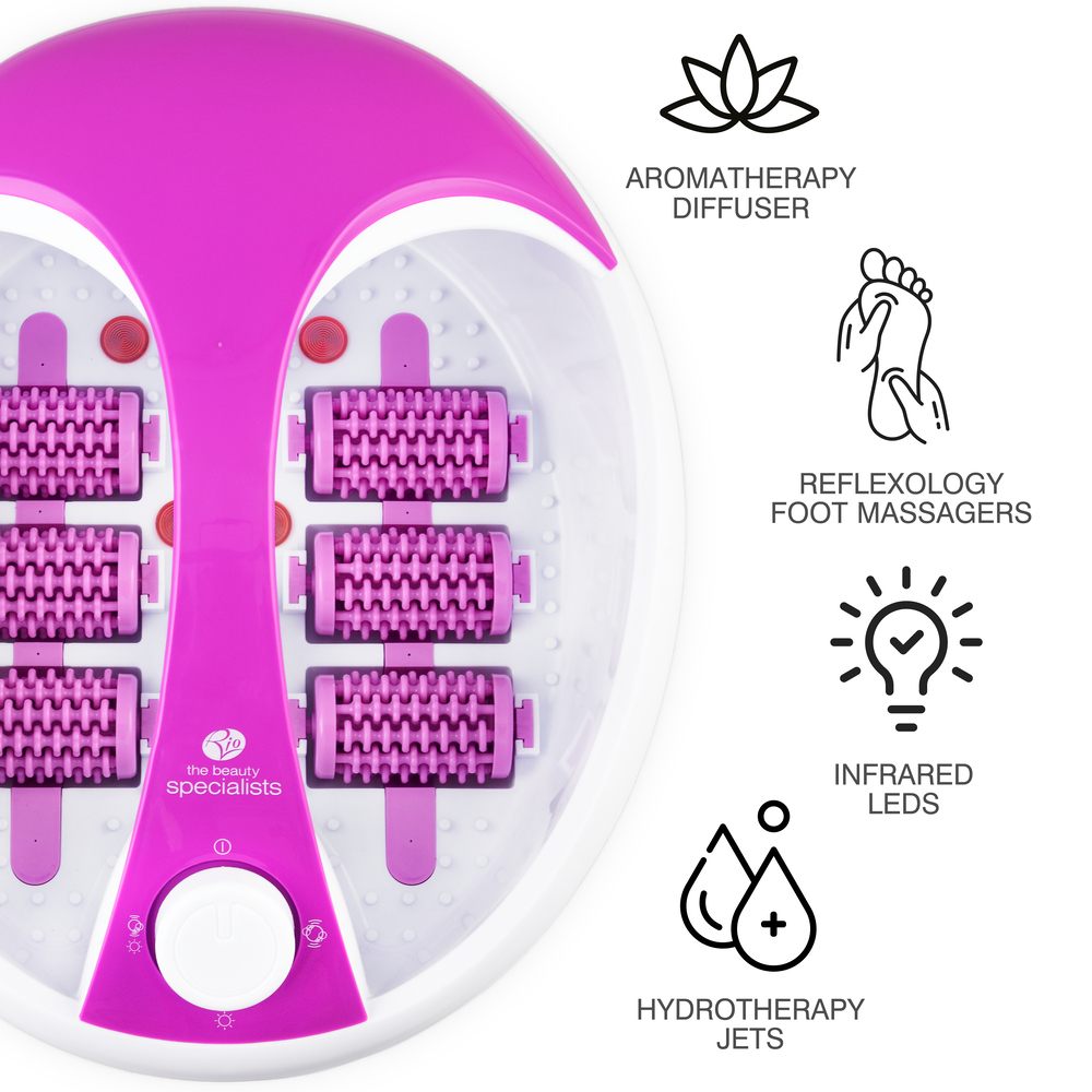 The Rio Deluxe Foot Spa Bath and Massager in purple is shown with four textured rollers. Icons and text highlight aromatherapy diffuser, reflexology foot massagers, infrared LEDs, and hydrotherapy jets.