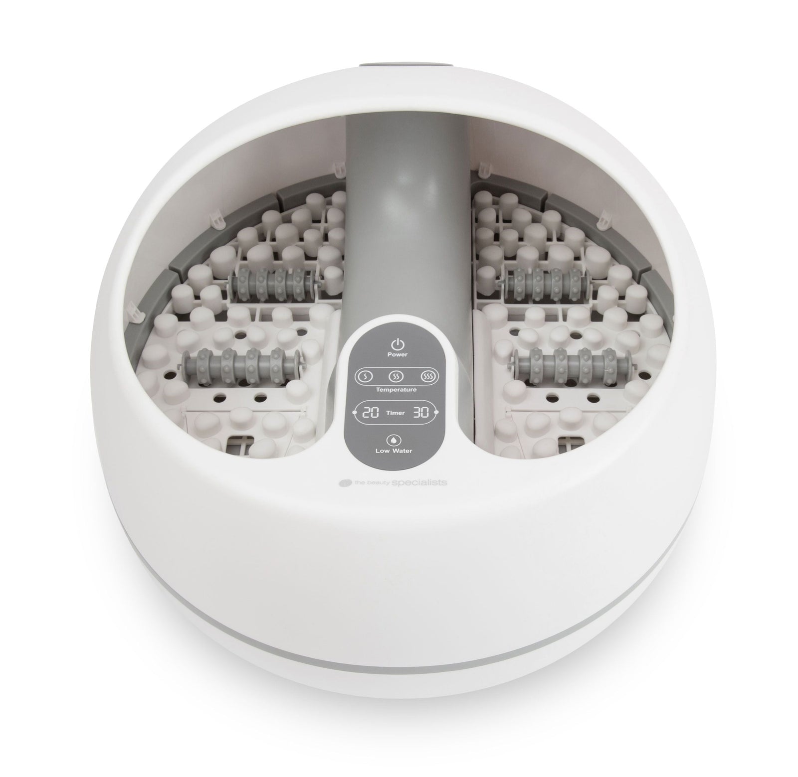 above view of steam foot spa with splash cover open showing inside pebble base and foot rollers