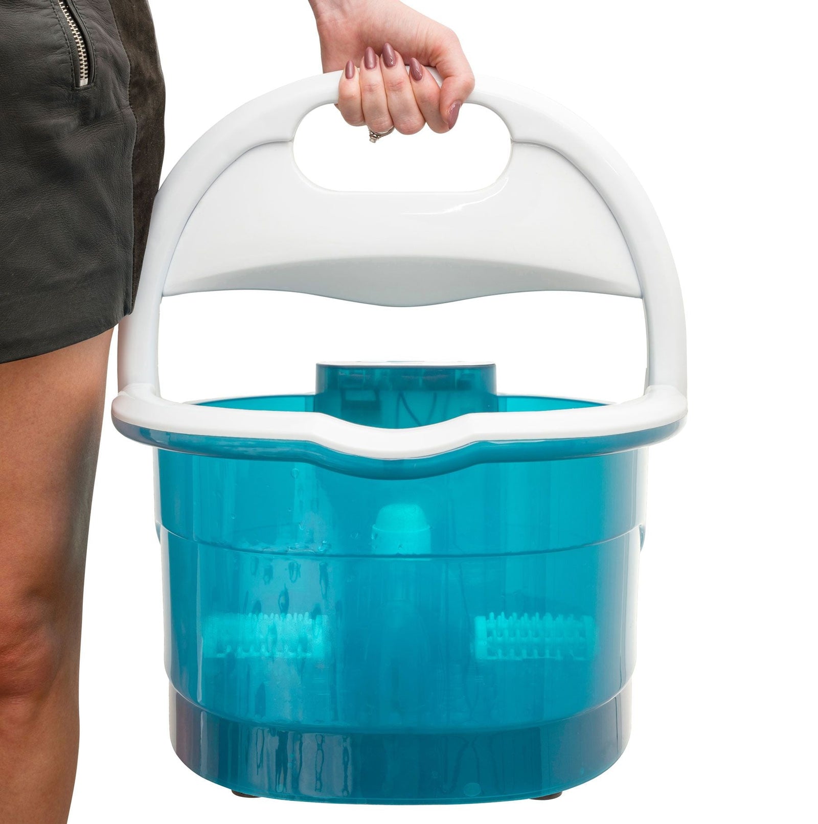 lady carrying the multi-functional motorised foot spa by the carry handle