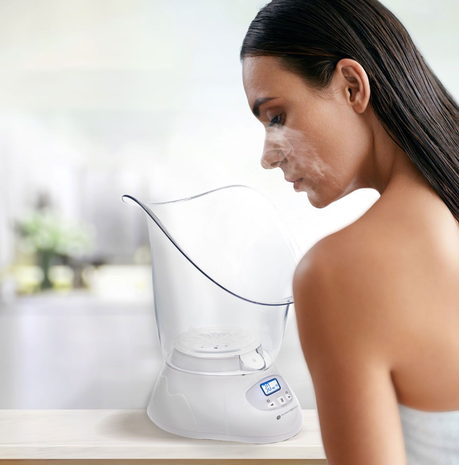 Women using facial sauna with oily skin