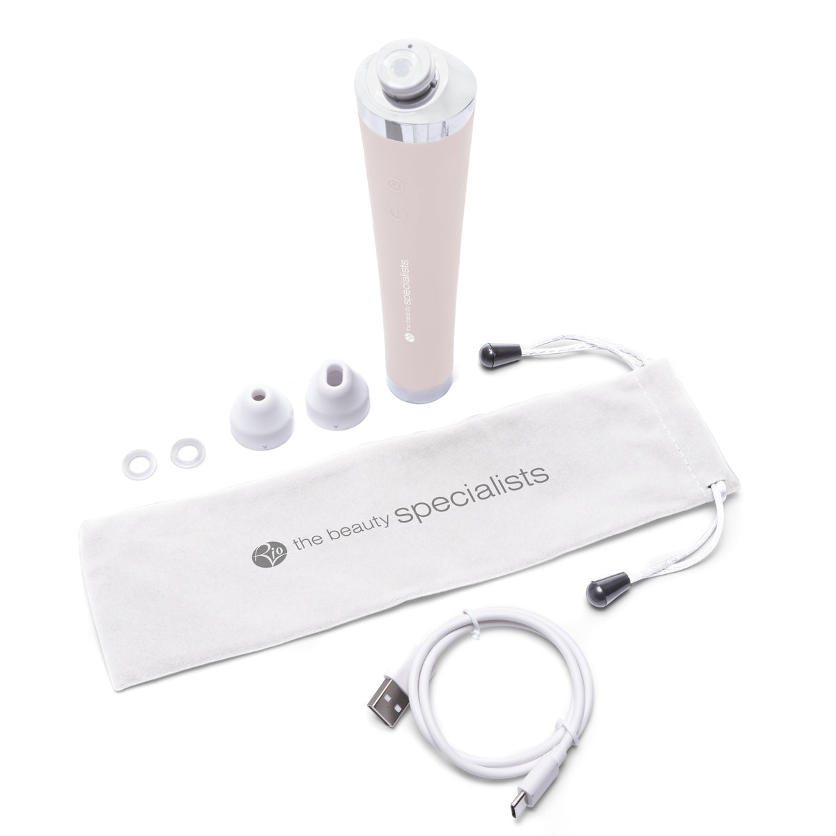 The Rio Pore Perfection is a white beauty device for personalised skincare, featuring two silicone attachments, two small rings, a white USB charging cable, and a branded drawstring pouch—all arranged on a white background.