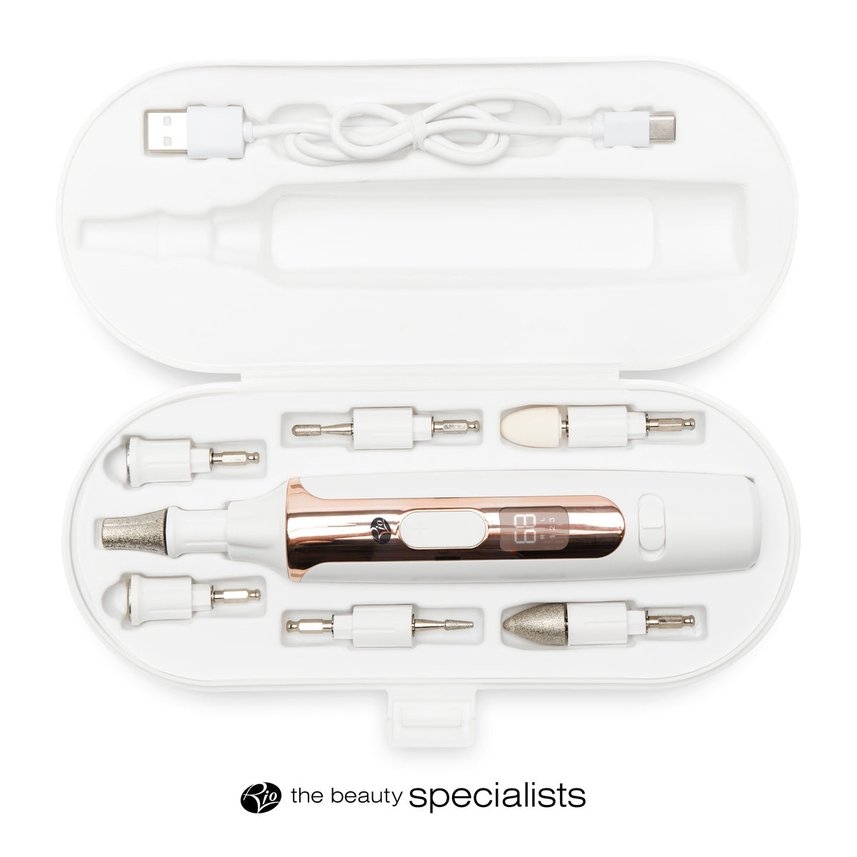 The Rio Precision Pro Electric Nail File comes in a white case with rose gold accents, six interchangeable drill bits, a USB charging cable, and “the beauty specialists” logo beneath the case.