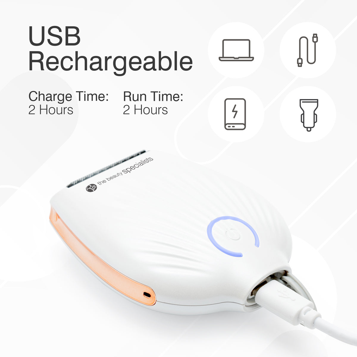 The Rio GO SMOOTH Lady Shaver in white charges via USB. Image text highlights USB Rechargeable, 2-hour charge and run time, and icons for flexible charging—ideal for smooth, effortless shaving anywhere.