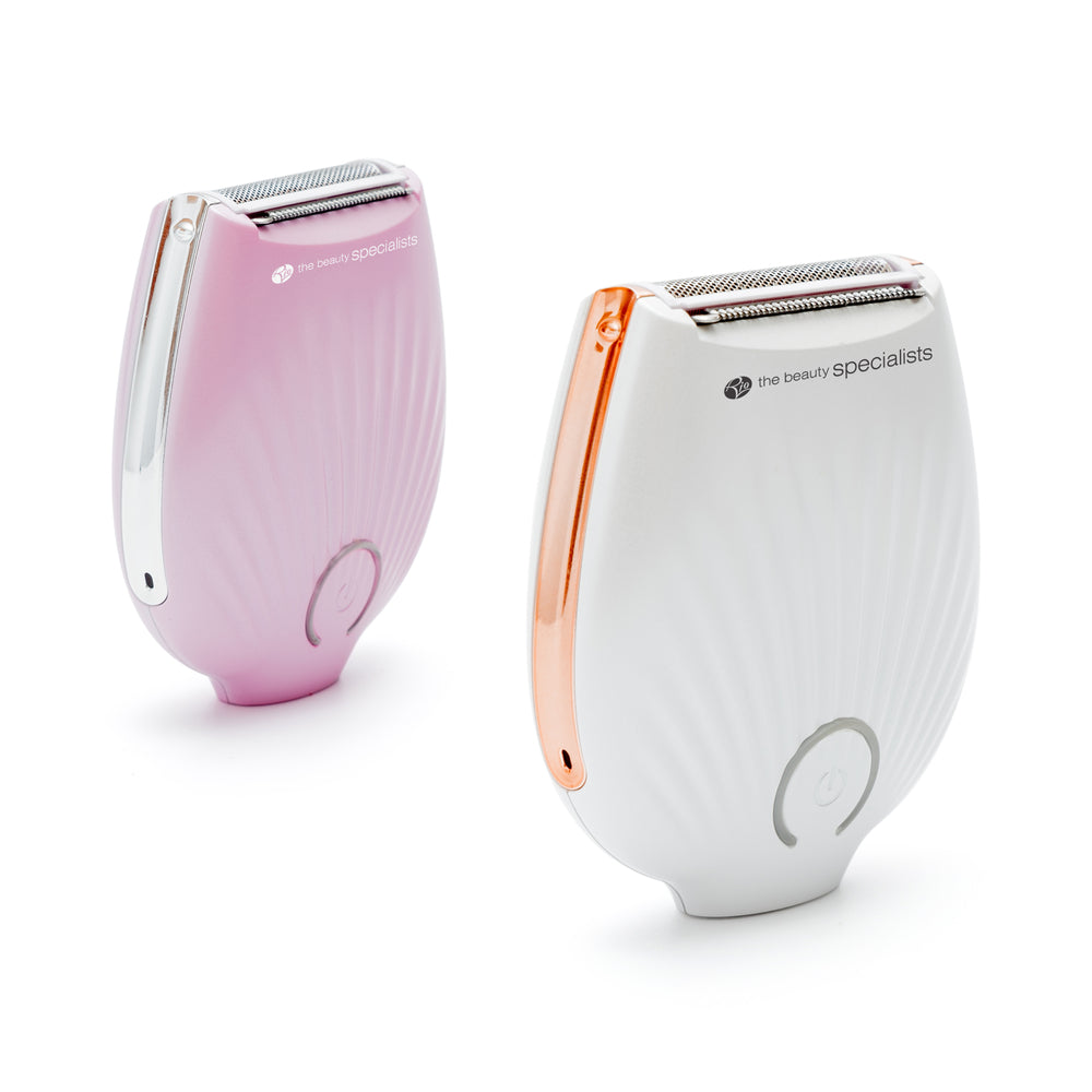 The Rio GO SMOOTH Lady Shaver comes in light pink with silver accents and white with rose gold accents, both featuring a shell-like design and labeled the beauty specialists for effortless shaving.