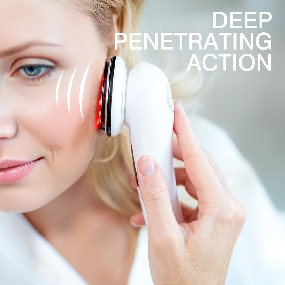 A woman uses the Rio Face Lift & Tone Beauty Spa, which emits red light on her cheek. Text reads DEEP PENETRATING ACTION as white streak graphics show waves reaching deep for firmer-looking skin.