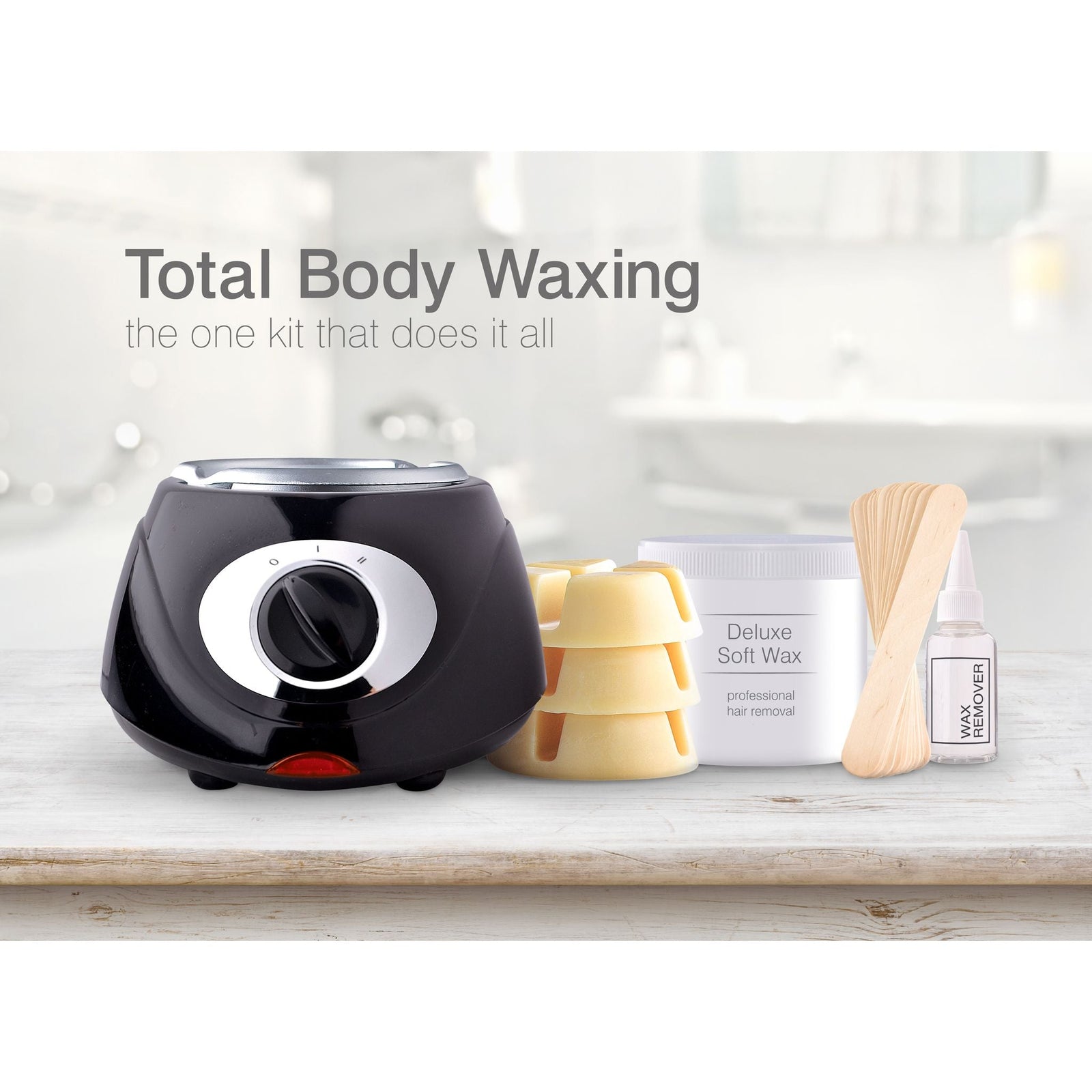 The Rio Go Smooth Hair Removal Home Waxing Kit includes a black wax warmer, three round wax blocks, a Deluxe Soft Wax jar, wooden spatulas, and a small bottle. “Total Body Waxing” makes it easy to remove hair at home.