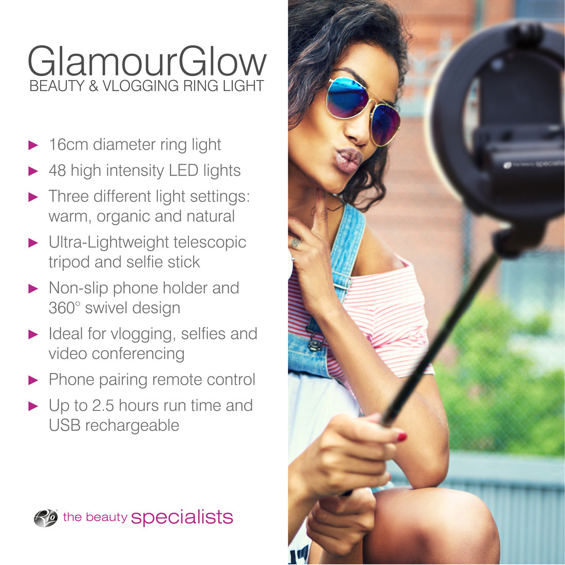 A woman takes a selfie outdoors with her smartphone on the Rio GlamourGlow Pro Beauty & Vlogging Ring Light, featuring adjustable LEDs, a tripod, and remote control—ideal for flawless makeup application and content creation.