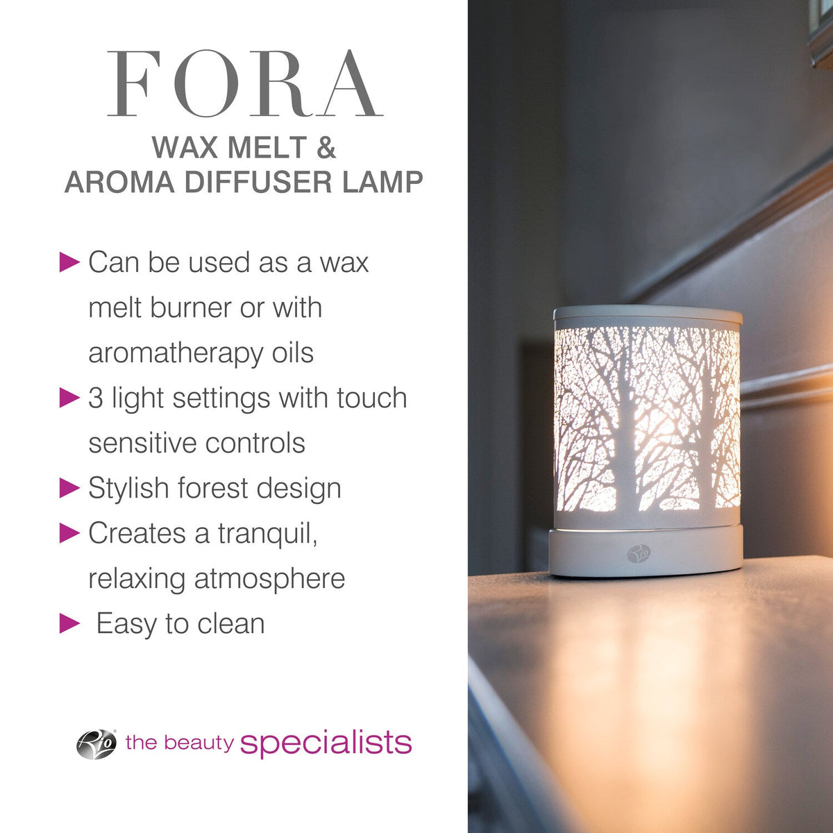 The Rio FORA Wax Melt Burner & Aroma Diffuser Lamp features a tree silhouette, touch controls, 3 light modes, easy cleaning, and aromatherapy use—relax in style. Displayed on a wooden surface.