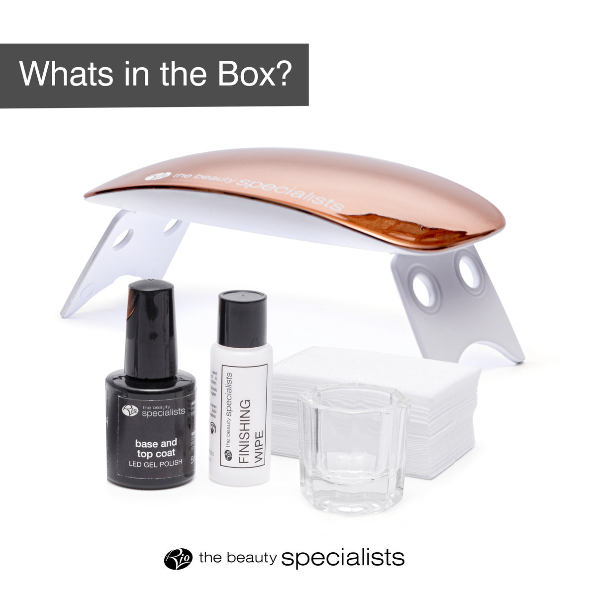 The Rio 14 Day Gel Polish Nails kit includes a UV LED lamp, base and top coat for lasting shine, finishing wipe, glass container, and nail wipes. Text reads Whats in the Box? and the beauty specialists.