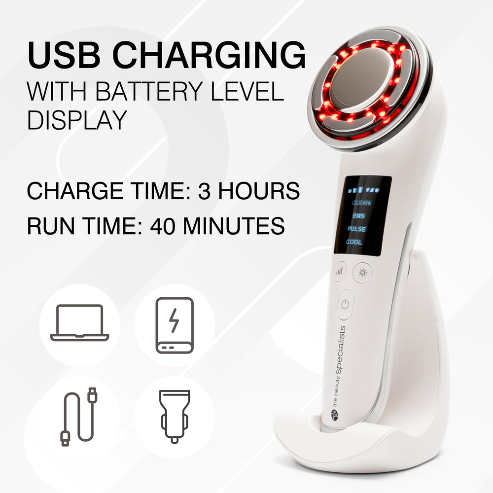The Rio Face Lift & Tone Beauty Spa is a white handheld anti-aging device with red LED lights, a round head, and charging stand. Features USB charging, battery level display, 3-hour charge time, and 40-minute runtime for firmer-looking skin.