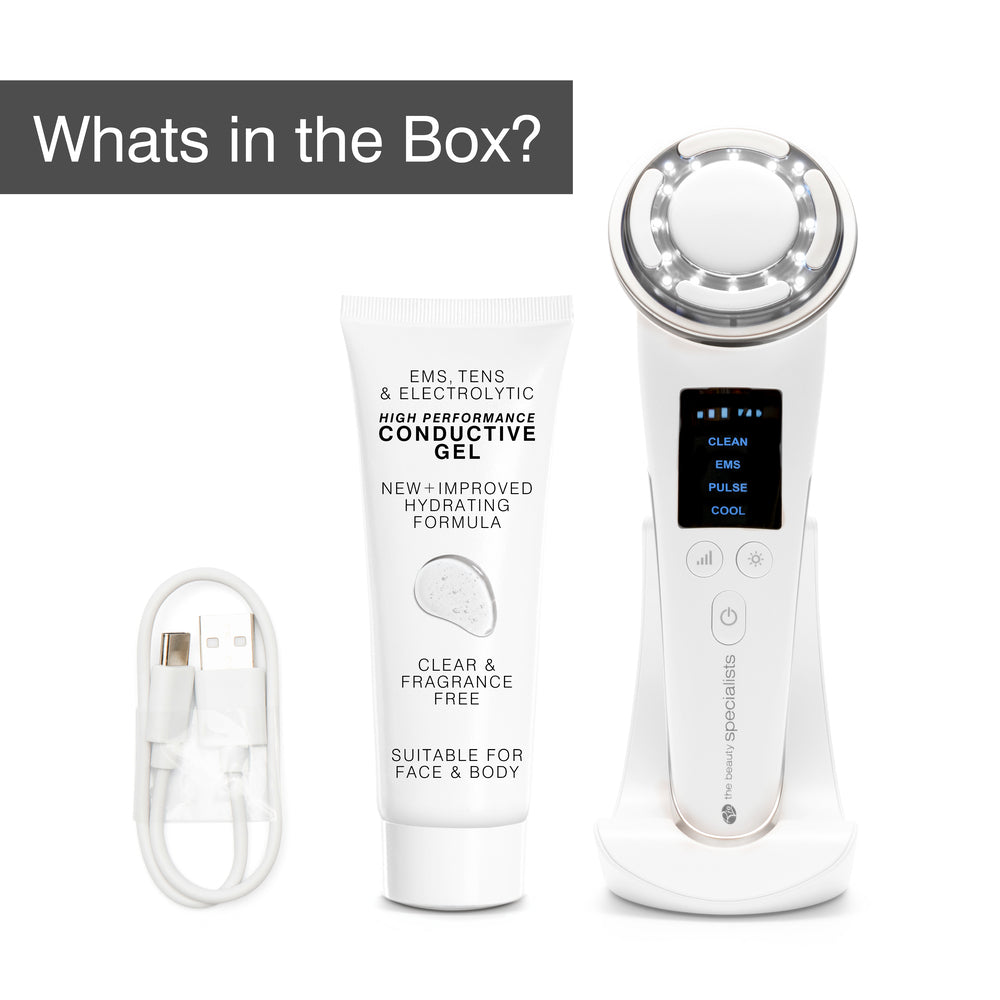The Rio Face Lift & Tone Beauty Spa facial device, a tube of conductive gel, and a USB charging cable are displayed on a white background. A gray box reads: What's in the Box?.