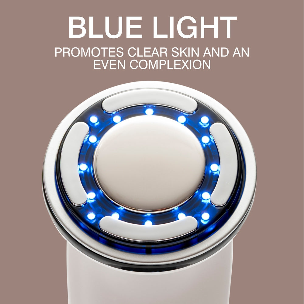 A close-up of the Rio Face Lift & Tone Beauty Spa device emitting blue LED lights, with text above reading Blue Light Promotes Clear Skin and an Even Complexion on a taupe background.