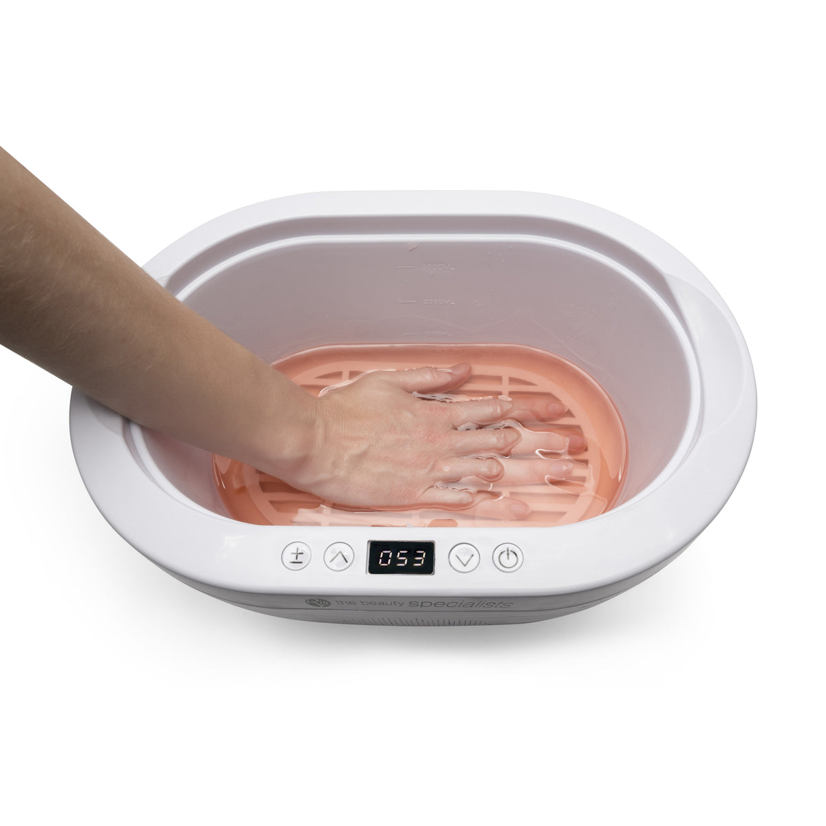 A hand is eased into the Rio Paraffin Wax Heater, soaking in a pink bath for hydrating comfort as the device’s digital display reads 53.