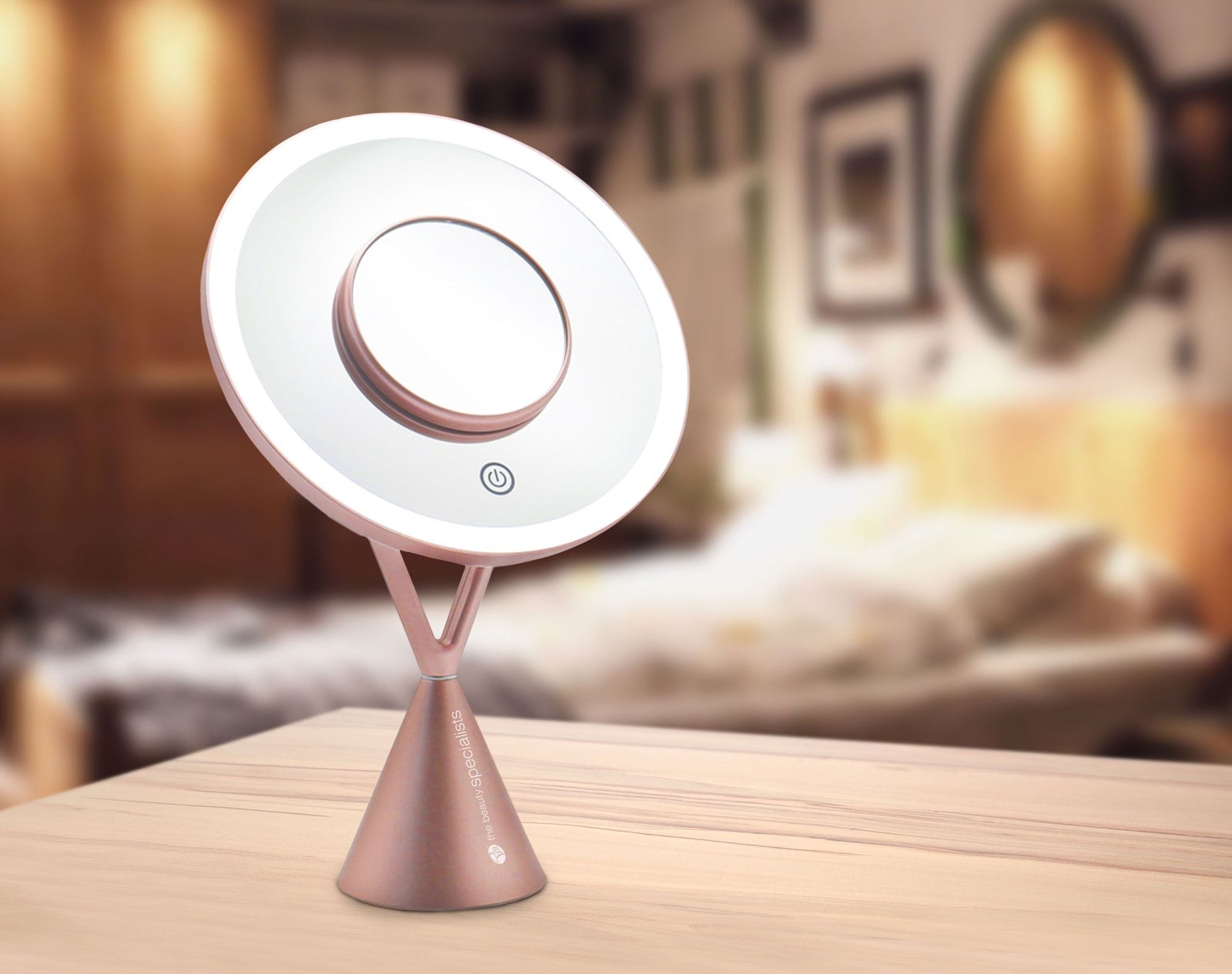 HD illuminated make up mirror with ring light illuminated placed on wooden table with bedroom background