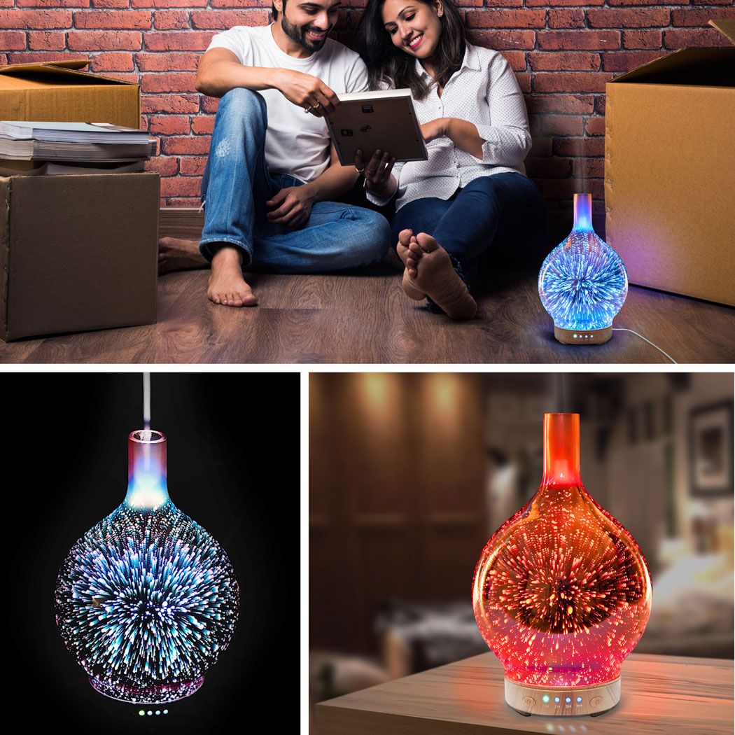 A smiling couple sits by moving boxes, looking at a tablet next to the Rio ELLA Aroma Diffuser, Humidifier and Night-Light. Close-ups show its blue and red glow with starburst light effects for a soothing atmosphere.