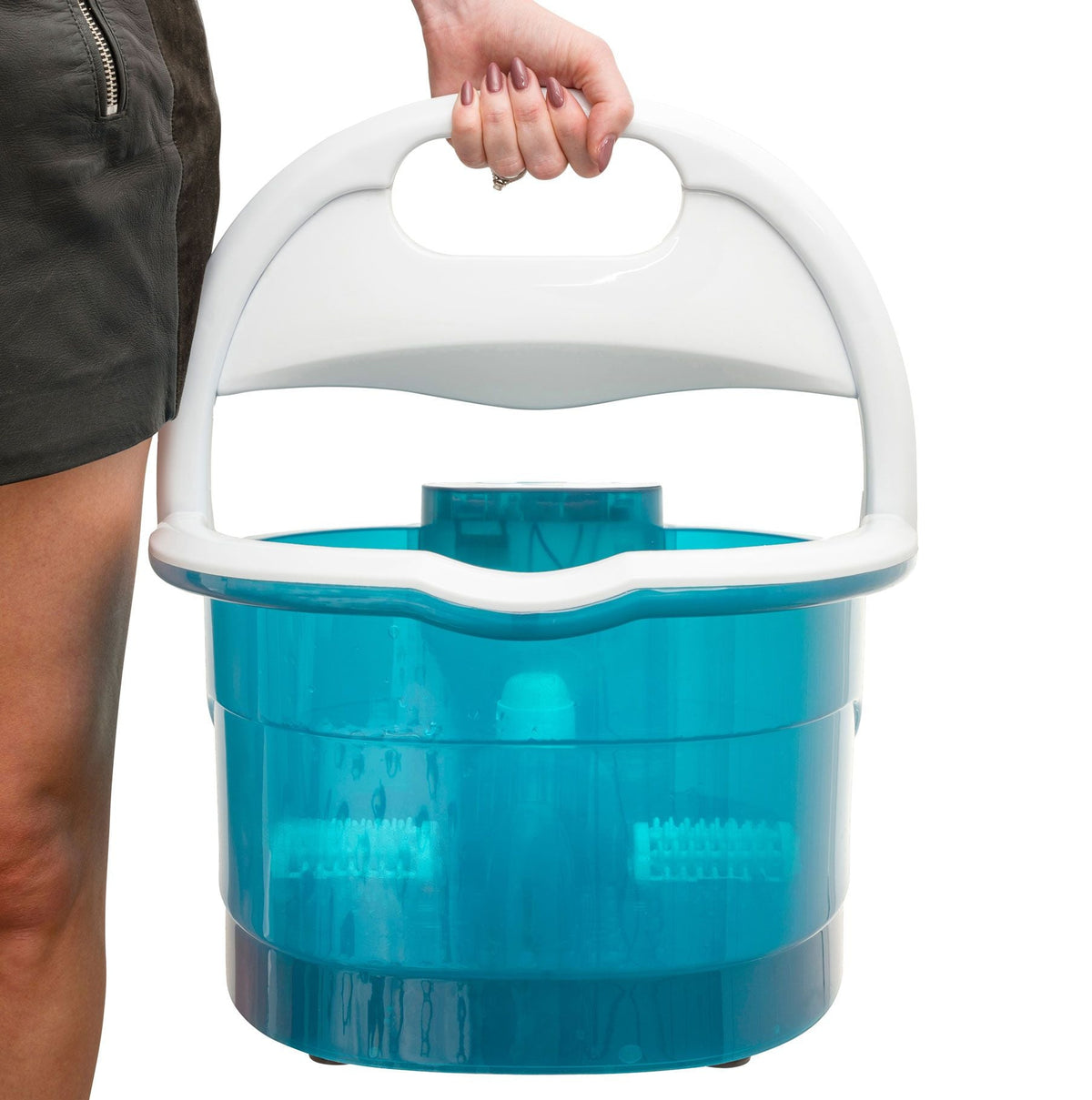 lady carrying the multi-functional motorised foot spa by the carry handle 