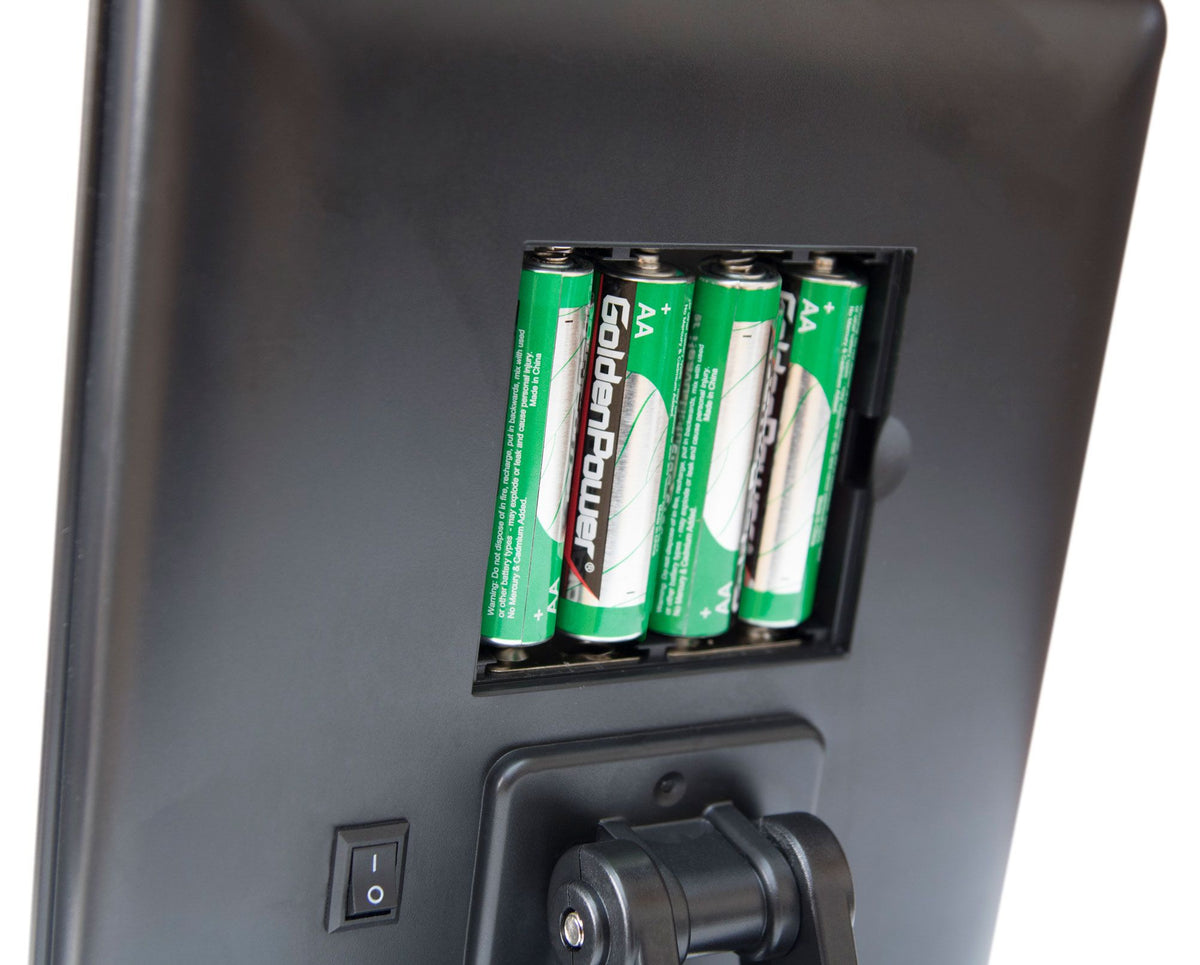 back of mirror with battery cover removed showing 4 44 batteries