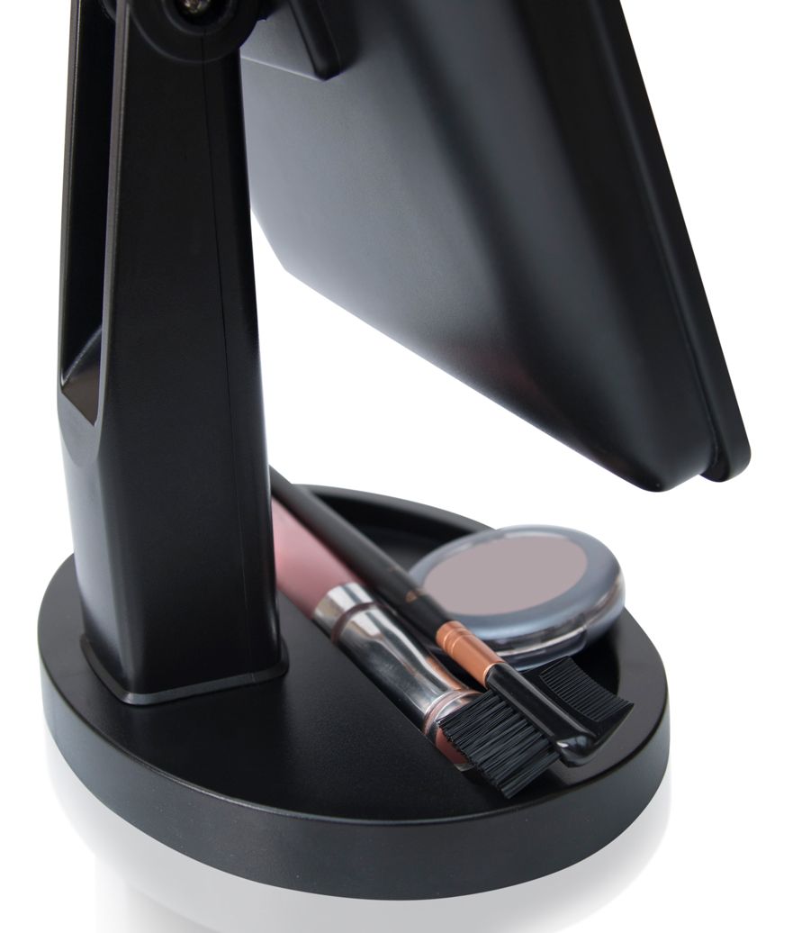 close up of integrated storage tray with cosmetics stored inside