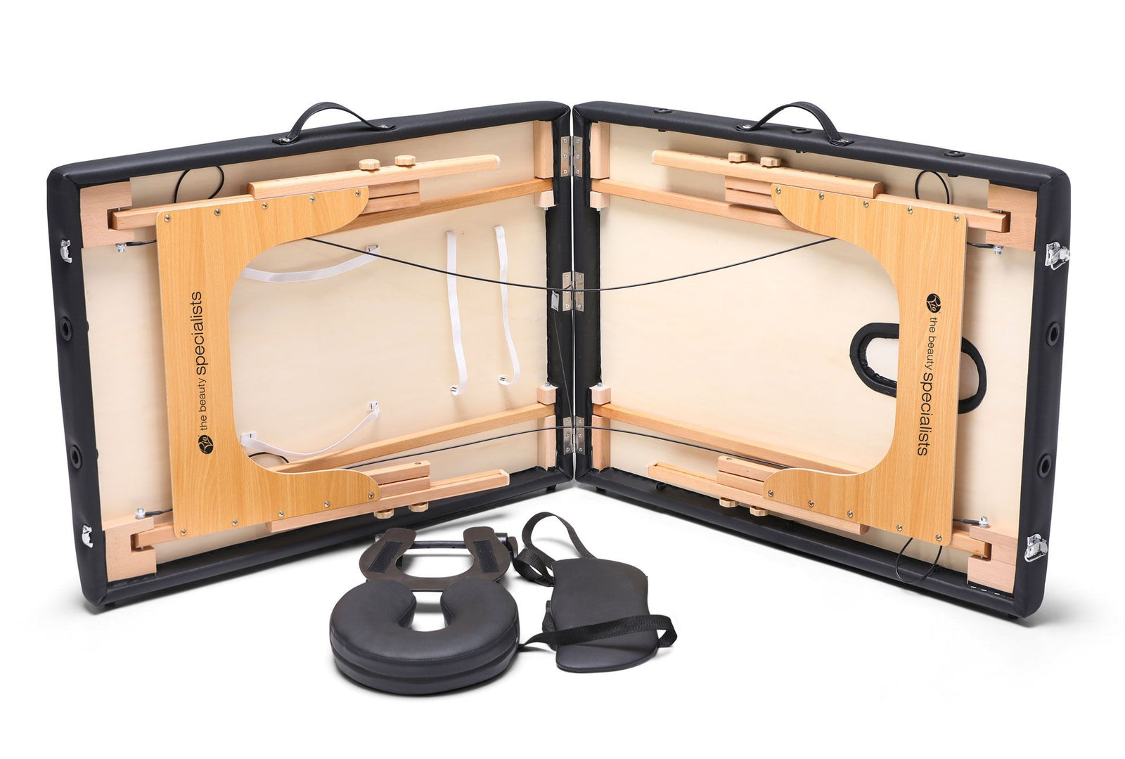 The Rio Professional Ultra-Light Portable Massage Table folds open to reveal a sturdy wooden frame, internal compartments, and neatly stored accessories like a face cradle, headrest cushion, and straps—perfect for professional massage treatments.
