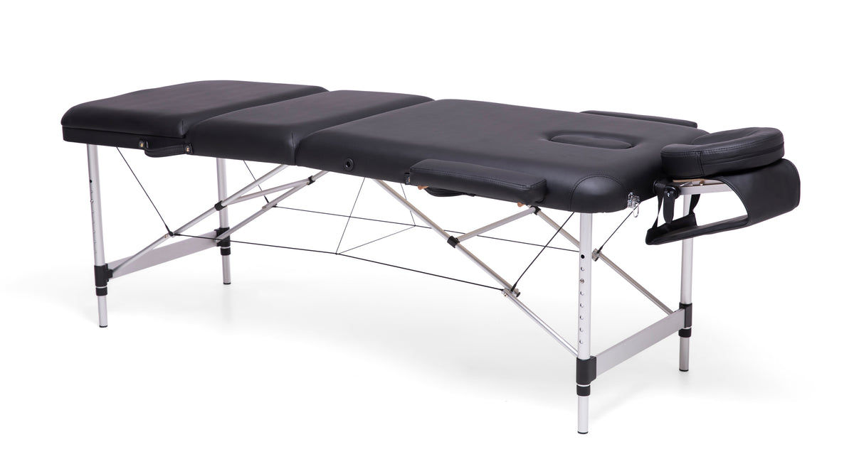 The Rio Professional Aluminium Massage Table & Treatment Couch features metal legs, a padded surface, adjustable height, and a face cradle—perfect for at-home massage—set against a white background.